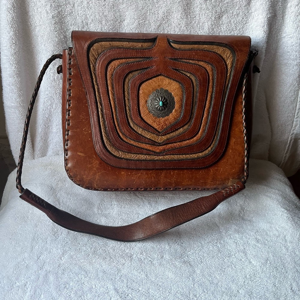 Vintage Rare Wyly’s hand tooled leather saddle bag with turquoise medalion